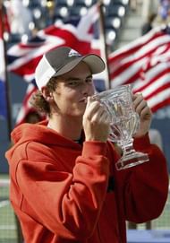 NEW YORK - SEPTEMBER 12:  Boy's Junior winner, Andrew Murray of Great Britain stands with his trophy during the US Open September 12, 2004 at the USTA National Tennis Center in Flushing Meadows Corona Park in the Flushing neighborhood of the Queens borough of New York.Murray defeated Sergiy Stakhovsky of the Ukraine. (Photo by Clive Brunskill/Getty Images)